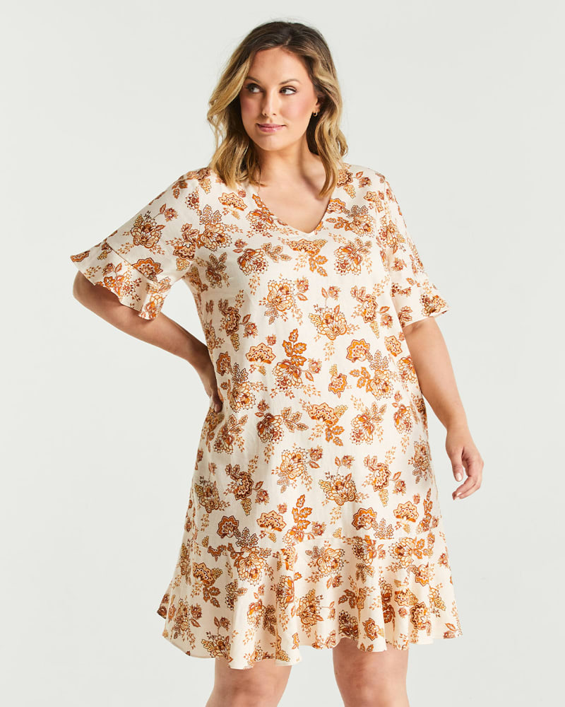 Front of a model wearing a size 4X Earth Blooms Ruffle Dress in Print by Estelle. | dia_product_style_image_id:264465